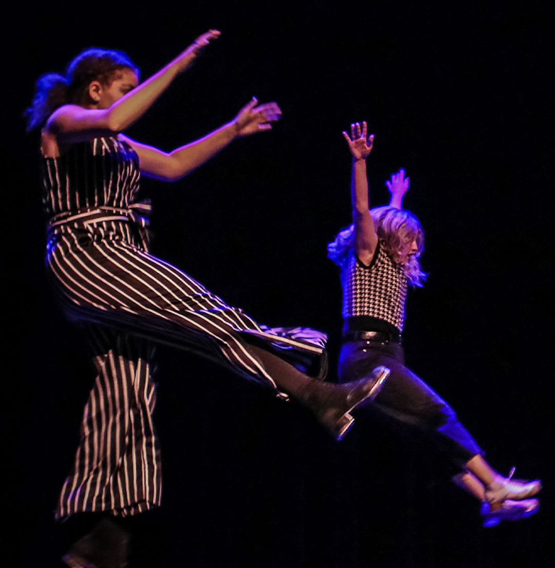 YTE tap dancers, mid-leap