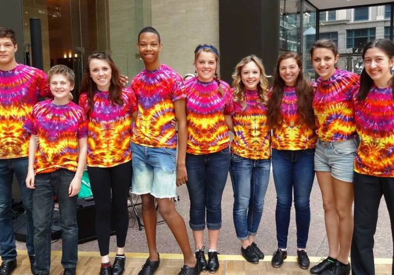 group of happy tap dancers